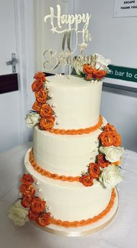 70th Birthday 3 Tier Buttercream finish with fresh roses